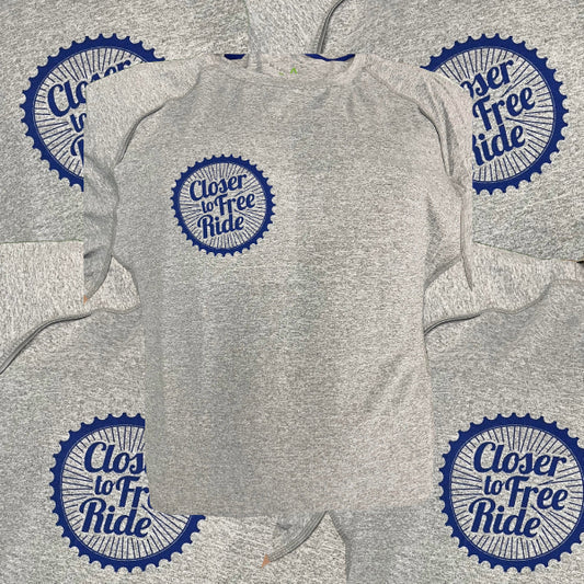 Gray t-shirt with blue 'Closer to Free Ride' logo on a gray background